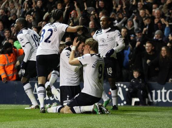 Tottenhams Roman Pavlyuchenko (9) celebrates scoring his sides opening goal with teammate Gareth Bale (front) - Tottenham Hotspur vs. Chelsea FC EDITORIAL USE ONLY. No use with unauthorised audio, video, data, fixture lists, club league logos or live services. Online in-match use limited to 120 images, no video emulation. No use in betting, games or single club league player publications. o0 Freude