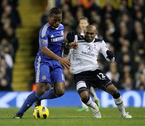 Tottenhams Wilson Palacios tussles with Chelseas Didier Drogba - Tottenham Hotspur (white) vs. Chelsea FC (blue) EDITORIAL USE ONLY. No use with unauthorised audio, video, data, fixture lists, club league logos or live services. Online in-match use limited to 120 images, no video emulation. No use in betting, games or single club league player publications.