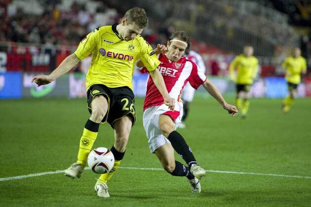 Lukasz PISZCZEK (BVB, li.) gegen Diego CAPEL (Sevilla) - FC Sevilla vs. Borussia Dortmund 2:2