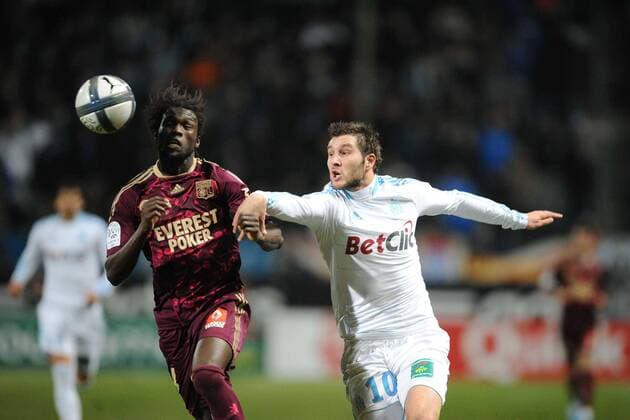 Ligue 1, Olympique Marseille (weiß) - Olympique Lyon (rot): Andre Pierre GIGNAC (re.) gegen Pape DIAKHATE - NxLEGOUICxFEP - 