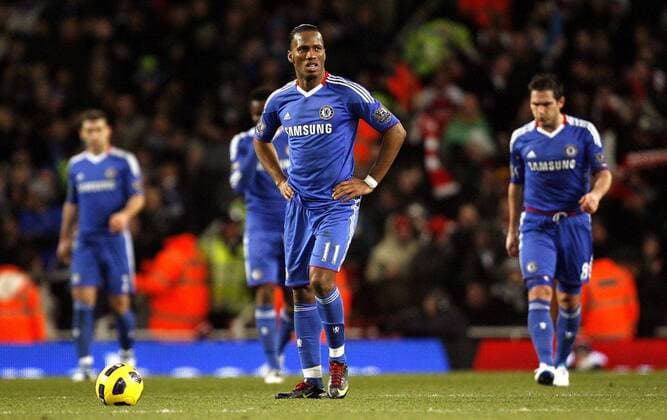 Dejection for Didier Drogba (C) and Chelsea after Arsenal scored their first goal - Barclays Premier League, Arsenal FC (red) v Chelsea 27th December, 2010 EDITORIAL USE ONLY. No use with unauthorised audio, video, data, fixture lists, club league logos or live services. Online in-match use limited to 120 images, no video emulation. No use in betting, games or single club league player publications.