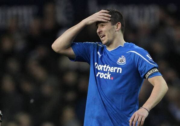 Newcastles Joey Barton looks on dejected Barclays Premier League Tottenham Hotspur (white) vs Newcastle United (blue) 28th December, 2010 EDITORIAL USE ONLY. No use with unauthorised audio, video, data, fixture lists, club league logos or live services. Online in-match use limited to 120 images, no video emulation. No use in betting, games or single club league player publications.