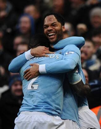 Football - Barclays Premiership - Manchester City (blue) vs. Aston Villa (black). Manchester City s Joleon Lescott (R) celebrates scoring their second goal with his head at the City of Manchester Stadium  o0 Jubel, Freude