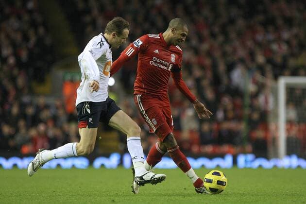 Premier League, FC Liverpool vs. Bolton Wanderers: Matthew Taylor of Bolton and David N Gog of Liverpool FC (red) in action at Anfield 