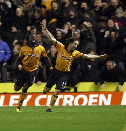 Stephen Hunt of Wolves (R) celebrates his goal with teammate George Elokobi - Wolverhampton Wanderers vs. Chelsea FC EDITORIAL USE ONLY. No use with unauthorised audio, video, data, fixture lists, club league logos or live services. Online in-match use limited to 120 images, no video emulation. No use in betting, games or single club league player publications. o0 Freude