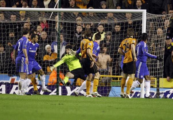 Jose Boswinga of Chelsea, second from left, appears to score an own-goal tut Wolves 1-0 ahead, Wolverhampton Wanderers (yellow) - FC Chelsea London (blue) EDITORIAL USE ONLY. No use with unauthorised audio, video, data, fixture lists, club league logos or live services. Online in-match use limited to 120 images, no video emulation. No use in betting, games or single club league player publications.