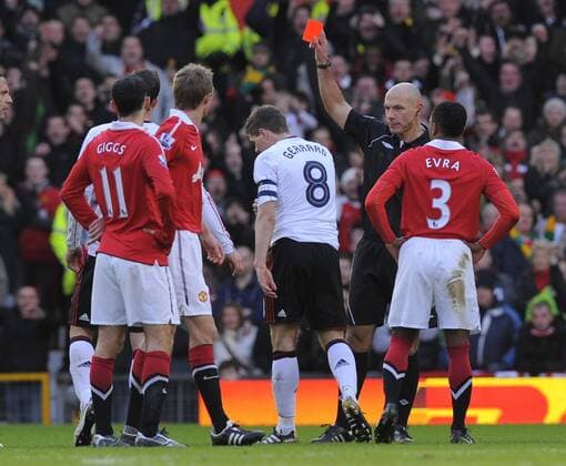 Steven Gerrard (C) of Liverpool sent off by referee Howard Webb - FA Cup 3rd Round - Manchester United (ManU) vs. Liverpool FC 1:0 - EDITORIAL USE ONLY. No use with unauthorised audio, video, data, fixture lists, club league logos or live services. Online in-match use limited to 120 images, no video emulation. No use in betting, games or single club league player publications.