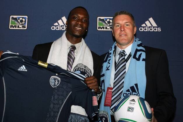 13 January 2011: Sporting Kansas City selected C.J. Sapong with the 10 overall pick. With head coach Peter Vermes (right). The 2011 MLS SuperDraft was held in the Ballroom at Baltimore Convention Center in Baltimore, MD during the NSCAA Annual Convention. Icon918110113043 EDITORIAL USE ONLY