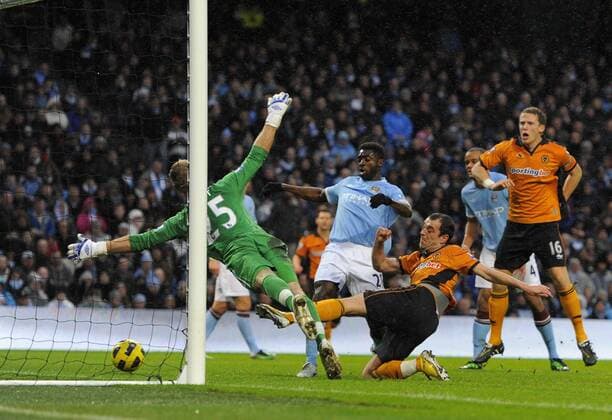 Nenad Milijas of Wolverhampton Wanderers (C) scores the first goal past Joe Hart of Manchester City - Manchester City - Wolverhampton Wanderers - EDITORIAL USE ONLY. No use with unauthorised audio, video, data, fixture lists, club league logos or live services. Online in-match use limited to 120 images, no video emulation. No use in betting, games or single club league player publications.