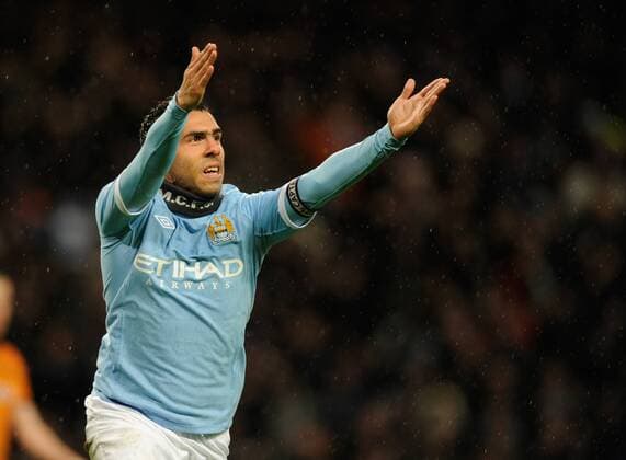 Carlos Tevez of Manchester City celebrates scoring the second goal - Manchester City - Wolverhampton Wanderers - EDITORIAL USE ONLY. No use with unauthorised audio, video, data, fixture lists, club league logos or live services. Online in-match use limited to 120 images, no video emulation. No use in betting, games or single club league player publications.