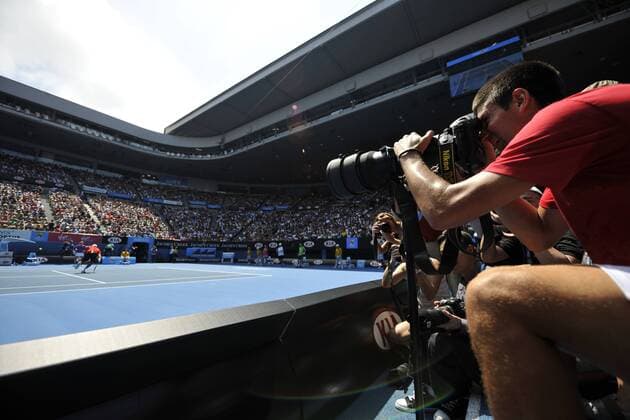 Rally for Relief charity match exhibition: Novak Djokovic (SRB) in the photographers position with camera. 