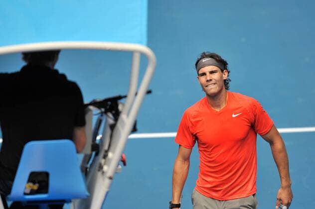 Jan. 16, 2011 - Melbourne, Victoria, Australia - Rafael Nadal ESP gets instructions at the Rally For Relief charity exhibition match by top players of the 2011 Australian Open at Melbourne Park. - ZUMAx35