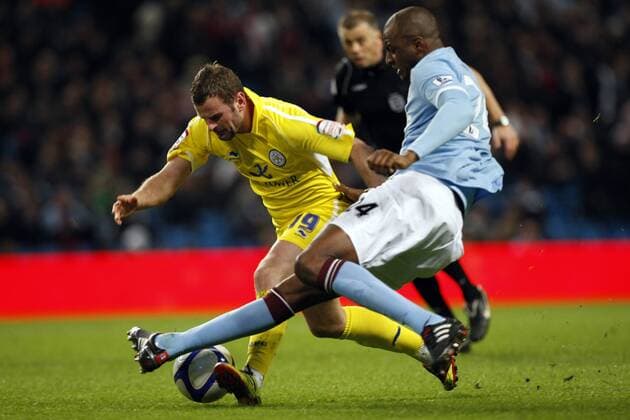 Leicesters Richie Wellens (L) with Manchester Citys Patrick Viera EON FA Cup 3rd Round replay Manchester City v Leicester City - EDITORIAL USE ONLY. No use with unauthorised audio, video, data, fixture lists, club league logos or live services. Online in-match use limited to 120 images, no video emulation. No use in betting, games or single club league player publications.