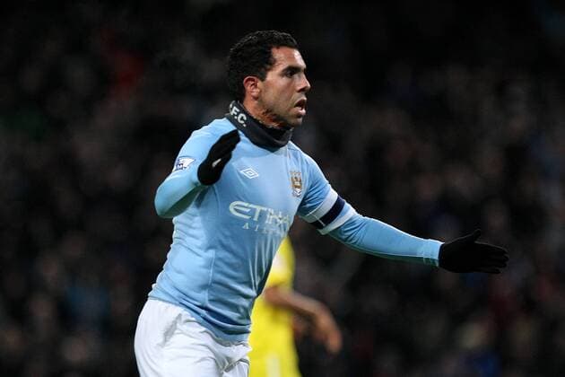 Football - FA Cup Third Round Replay - Manchester City vs. Leicester City Carlos Tevez of Manchester City celebrates his opening goal at the City of Manchester Stadium 