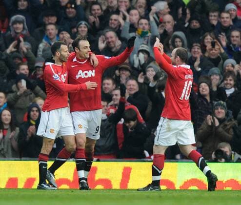 L-R: Ryan Giggs, Dimitar Berbatov, Wayne Rooney of Manchester United celebrate second goal Barclays Premier League Manchester United v Birmingham City 22nd January, 2011 EDITORIAL USE ONLY. No use with unauthorised audio, video, data, fixture lists, club league logos or live services. Online in-match use limited to 120 images, no video emulation. No use in betting, games or single club league player publications. o0 ManU
