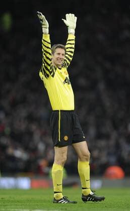 Edwin van der Sar of Manchester United celebrates Barclays Premier League Manchester United v Birmingham City 22nd January, 2011 EDITORIAL USE ONLY. No use with unauthorised audio, video, data, fixture lists, club league logos or live services. Online in-match use limited to 120 images, no video emulation. No use in betting, games or single club league player publications. o0 ManU