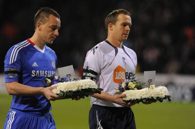 John Terry (L) of Chelsea FC and Kevin Davies of Bolton Wanderers lay wreaths in remembrance of former Bolton player Nat Lofthouse England) Barclays Premier League Bolton Wanderers v Chelsea FC 24th January, 2011 EDITORIAL USE ONLY. No use with unauthorised audio, video, data, fixture lists, club league logos or live services. Online in-match use limited to 120 images, no video emulation. No use in betting, games or single club league player publications.