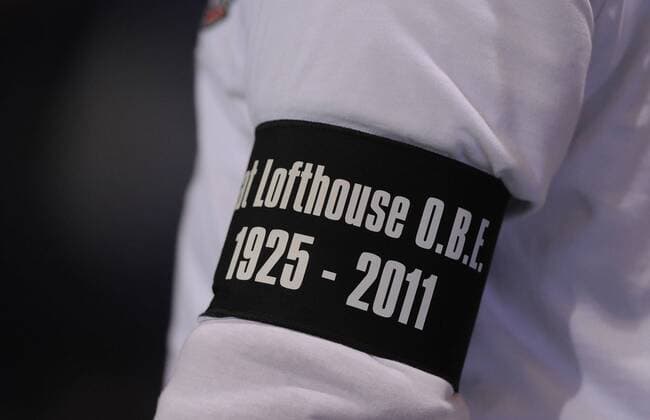 Black arm band on Bolton shirt in remembrance of former Bolton player Nat Lofthouse - Premier League - Bolton Wanderers - EDITORIAL USE ONLY. No use with unauthorised audio, video, data, fixture lists, club league logos or live services. Online in-match use limited to 120 images, no video emulation. No use in betting, games or single club league player publications.