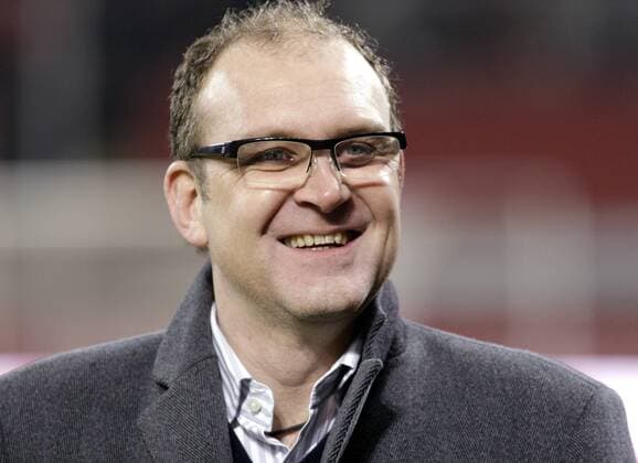 Hannover s Sportdirektor Jörg Schmadtke laughs, Bayer 04 Leverkusen - Hannover 96 o0 Funktionär
