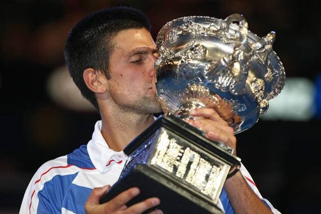 Novak Djokovic, SRB, kissing the trophy after the 2011 Australian Open men s singles final in Melbourne, 30 01 2011 -
