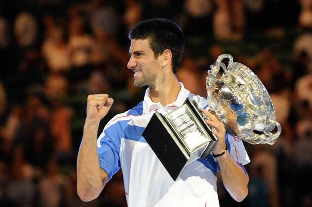 Novak Djokovic (SRB) celebrates winning the men s singles final match on day fourteen of the 2011 Australian Open at Melbourne Park, Australia. - ZUMAx35