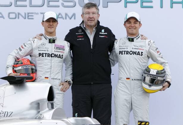 Motorsports Formula 1: World Championship 2011, Test Valencia, L-R: Michael Schumacher (GER, Mercedes GP Petronas), Ross Brawn ( Mercedes GP team principal ), 04 Nico Rosberg (GER, Mercedes GP Petronas), with the new Mercedes GP car MGP W02 xHOCHxZWEIx xJuergenxTapx o0 Präsentation o0 Teamchef