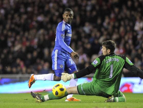 Chelsea FC s Salomon Kalou scores his side s second goal vs goalkeeper Craig Gordon. Barclays Premier League AFC Sunderland v Chelsea FC 1st February, 2011 EDITORIAL USE ONLY. No use with unauthorised audio, video, data, fixture lists, club league logos or live services. Online in-match use limited to 120 images, no video emulation. No use in betting, games or single club league player publications.