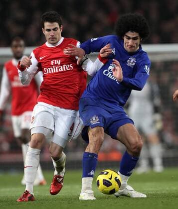 FC Arsenals Cesc Fabregas (L) tussles with FC Evertons Marouane Fellaini Barclays Premier League FC Arsenal v FC Everton 1st February, 2011 EDITORIAL USE ONLY. No use with unauthorised audio, video, data, fixture lists, club league logos or live services. Online in-match use limited to 120 images, no video emulation. No use in betting, games or single club league player publications. o0 London