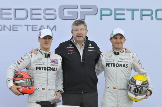 v.li.: Michael Schumacher, Teamchef Ross Brawn und Nico Rosberg waehrend der Praesentation des Mercedes MGP W02 in Valencia
