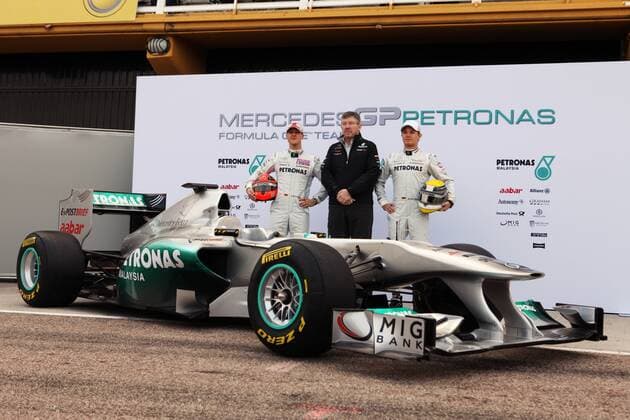 Feb. 1, 2011 - Valencia - (L to R): Michael Schumacher (GER) Mercedes GP with Ross Brawn (GBR) Mercedes GP Team Principal and Nico Rosberg (GER) Mercedes GP with the new Mercedes GP MGP W02. Formula One Testing, Day 1.  - ZUMAorl o0 Bolide Funktionär