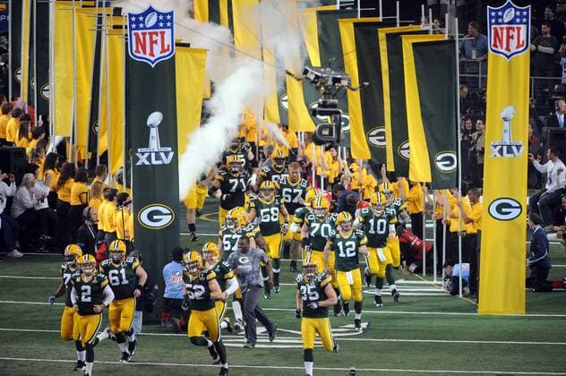 The Green Bay Packers take the field against the Pittsburgh Steelers before Super Bowl XLV at Cowboys Stadium in Arlington, Texas on February 6, 2011.  SBP2011020668