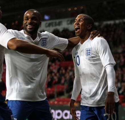 Englands Ashley Young (R) celebrates scoring his sides second goal with Darren Bent International Friendly Denmark v England 9th February, 2011 EDITORIAL USE ONLY. No use with unauthorised audio, video, data, fixture lists, club league logos or live services. Online in-match use limited to 120 images, no video emulation. No use in betting, games or single club league player publications.