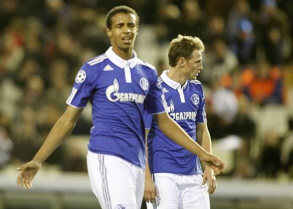 Schalke 04 s Joel Matip (L) and Benedikt Höwedes dejected --- Valencia CF vs. FC Schalke 04  (201102154721)