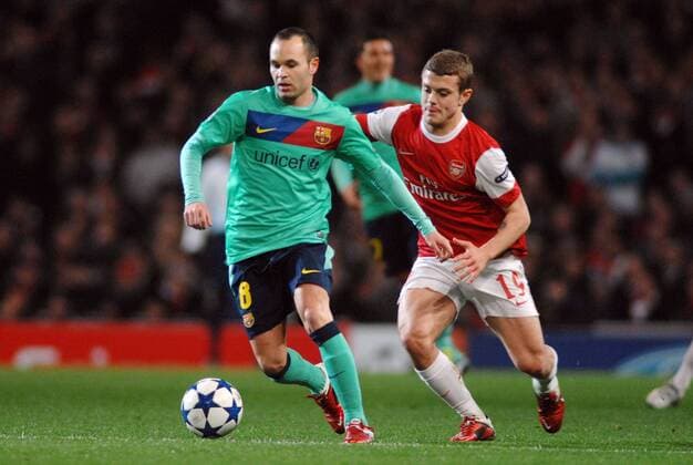 Football - Champions League - Arsenal London (red) vs. FC Barcelona (green) 16 02 2011 Andres Iniesta (Barcelona) Jack Wilshere (Ars) --- 