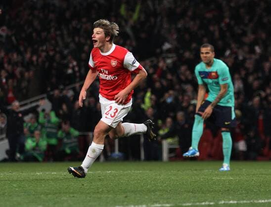 Arsenals Andrei Arshavin celebrates scoring his sides second goal --- UEFA Champions League 1st Leg last 16 Arsenal London (red) v FC Barcelona Barca (green) 16th February, 2011 EDITORIAL USE ONLY. No use with unauthorised audio, video, data, fixture lists, club league logos or live services. Online in-match use limited to 120 images, no video emulation. No use in betting, games or single club league player publications.
