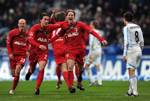 TSV 1860 München vs. FC Augsburg --- (v.li..) Tobias Werner, Paul Verhaegh und Marcel de Jong (alle Augsburg) sowie Aleksandar Ignjovski (1860 München)  o0 Jubel Freude