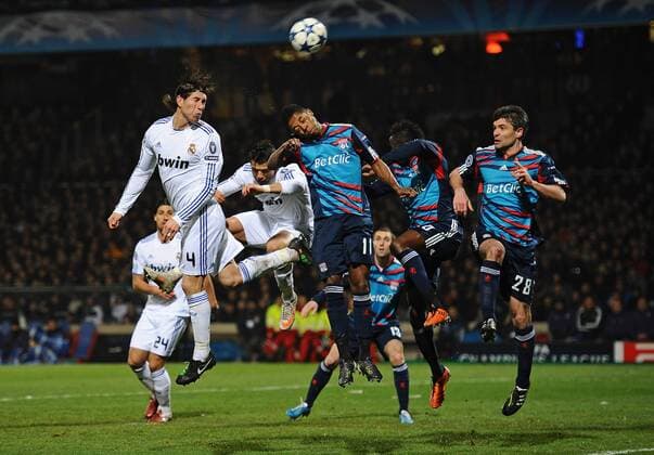 Olympique Lyon (blue) - Real CF Madrid (white), Sergio Ramos of Real Madrid heads towards goal - 