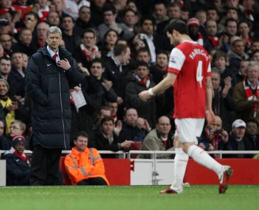 Arsenals coach Arsene Wenger watches as Cesc Fabregas goes off injured - Premier League - Arsenal FC London - Stoke City - EDITORIAL USE ONLY. No use with unauthorised audio, video, data, fixture lists, club league logos or live services. Online in-match use limited to 120 images, no video emulation. No use in betting, games or single club league player publications.