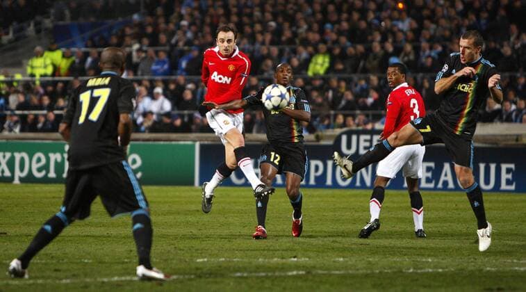 Dimitar Berbatov of Manchester United misses a chance --- Champions League Round of 16 First Leg - Olympique Marseille (blue) vs. Manchester United ManU (red) --- EDITORIAL USE ONLY. No use with unauthorised audio, video, data, fixture lists, club league logos or live services. Online in-match use limited to 120 images, no video emulation. No use in betting, games or single club league player publications.