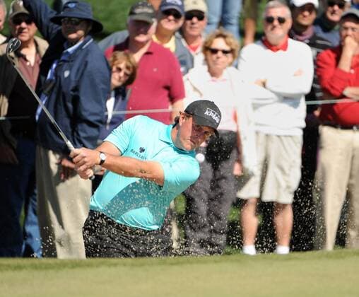 Phil Mickelson hits out of a sand trap on the second hole of the WGC-Accenture Match Play Championship at Dove Mountain Golf Course in Marana, AZ February 23,2011. UPI Art Foxall  PXP2011022307 WGC Matchplay WM