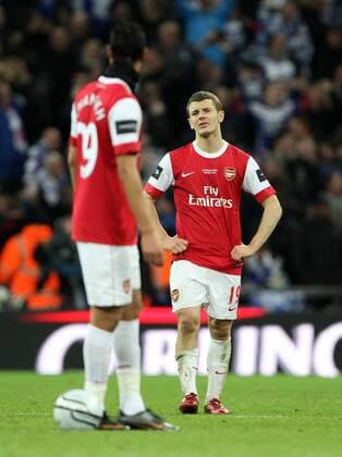 Arsenals Jack Wilshere looks on dejected after going 2-1 down --- Carling Cup Final, Arsenal London (red) v Birmingham City (blue), 27th February, 2011 EDITORIAL USE ONLY. No use with unauthorised audio, video, data, fixture lists, club league logos or live services. Online in-match use limited to 120 images, no video emulation. No use in betting, games or single club league player publications.