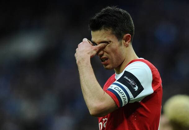 Football - League Cup Final - Arsenal (red) vs. Birmingham City (blue) --- Arsenal s captain for the day Robin van Persie feels the pressure at Wembley Stadium, London 