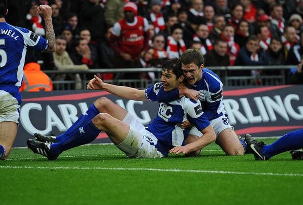 Football - League Cup Final - Arsenal (red) vs. Birmingham City (blue) --- Birmingham City s Nikola Zigic (L) celebrates his goal with Craig Gardner at Wembley Stadium, London 