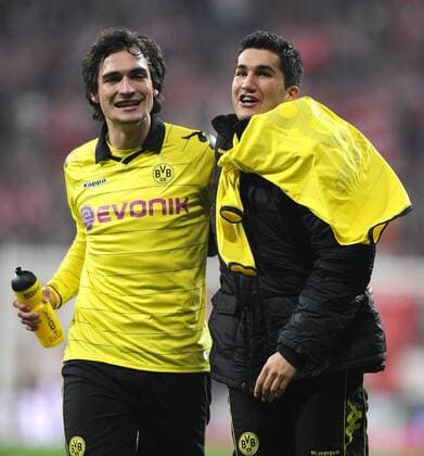 Fussball 1. Bundesliga : Saison 2010 2011 24. Spieltag 26.02.2011 FC Bayern Muenchen - BVB Borussia Dortmund JUBEL Mats Hummels , Nuri Sahin (v. li., Borussia Dortmund) 