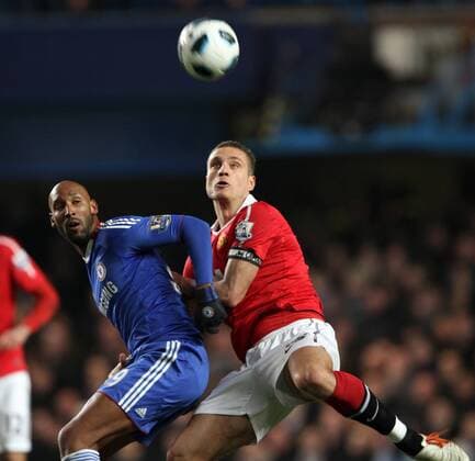 Chelsea s Nicolas Anelka (L) tussles with Manchester United s Nemanja Vidic Barclays Premier League, Chelsea FC London v Manchester United (ManU) 1st March, 2011 EDITORIAL USE ONLY. No use with unauthorised audio, video, data, fixture lists, club league logos or live services. Online in-match use limited to 120 images, no video emulation. No use in betting, games or single club league player publications.