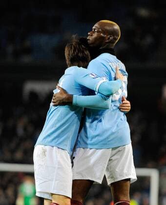 Mario Balotelli (R) of Manchester City celebrates scoring the second goal with David Silva of Manchester City EON FA Cup 5th Round Manchester City (blue) v Aston Villa (black) 2nd March, 2011 EDITORIAL USE ONLY. No use with unauthorised audio, video, data, fixture lists, club league logos or live services. Online in-match use limited to 120 images, no video emulation. No use in betting, games or single club league player publications.