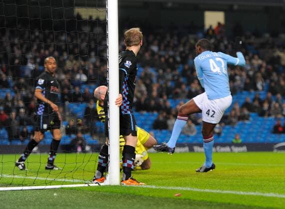Yaya Toure of Manchester City scores the first goal EON FA Cup 5th Round Manchester City (blue) v Aston Villa (black) 2nd March, 2011 EDITORIAL USE ONLY. No use with unauthorised audio, video, data, fixture lists, club league logos or live services. Online in-match use limited to 120 images, no video emulation. No use in betting, games or single club league player publications.