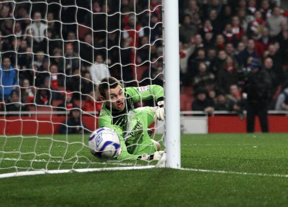 Leyton Orients Jamie Jones gets beaten for the opening goal EON FA Cup 5th Round Replay Arsenal London v Leyton Orient 2nd March, 2011 EDITORIAL USE ONLY. No use with unauthorised audio, video, data, fixture lists, club league logos or live services. Online in-match use limited to 120 images, no video emulation. No use in betting, games or single club league player publications.