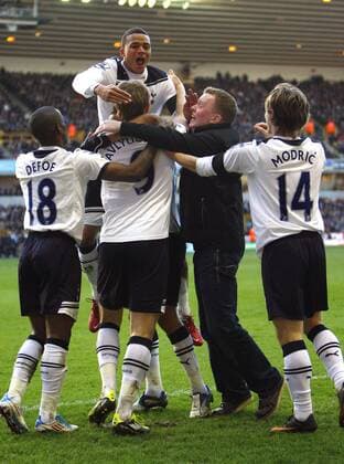 Roman Pavlyuchenko (3.L) of Tottenham Hotspur celebrates scoring his side s third goal Barclays Premier League Wolverhampton Wanderers v Tottenham Hotspur 6th March, 2011 EDITORIAL USE ONLY. No use with unauthorised audio, video, data, fixture lists, club league logos or live services. Online in-match use limited to 120 images, no video emulation. No use in betting, games or single club league player publications.