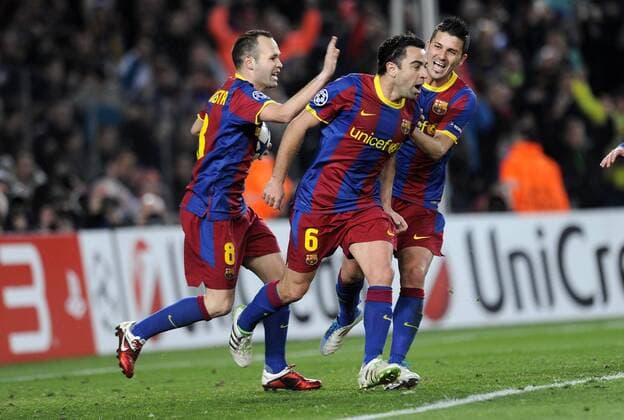 Champions League - Achtelfinale - FC Barcelona (Barca) - Arsenal FC London - L-R - Andres Iniesta - Xavi Hernandez und David Villa (Barca) - xPLargox - 